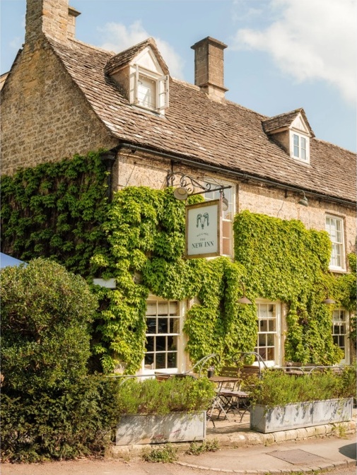 The New Inn’s ivy-covered exterior in Coln St Aldwyns